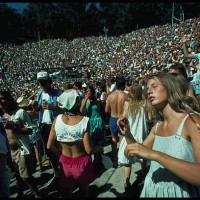 Sun-drenched fans dance to the music of the Grateful Dead at a concert in Berkeley's Greek Theater. Berkeley, California, USA.