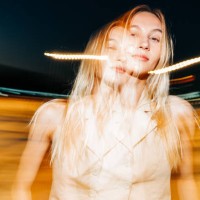 surreal double exposure portrait of a blonde woman with motion blur at night - fashion stock pictures, royalty-free photos & images