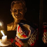 Surrounded by his favorite junk food, deputy David March's image is illuminated as family friends and colleagues gather, Tuesday, April 29 for a...