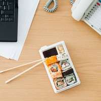 sushi at desk - junk food stock pictures, royalty-free photos & images