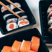 sushi in box lunches. takeaway sushi on the table. - junk food stock pictures, royalty-free photos & images