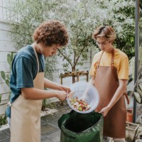 sustainable lifestyles of lgbtqia people are composting kitchen waste-stock photo - food stock pictures, royalty-free photos & images