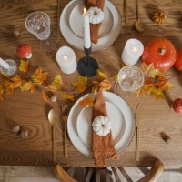 table setting with autumn table decor from candles, pumpkins, leaves, mushrooms - home decoration stock pictures, royalty-free photos & images