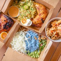 table top view malaysian food nasi kerabu, nasi ulam and ayam percik in recycled paper container with sauce - junk food stock pictures, royalty-free photos & images