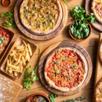 table top view of italian pizza. - junk food stock pictures, royalty-free photos & images