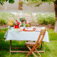 table with easter decor on the grass in the backyard garden - garden decoration stock pictures, royalty-free photos & images