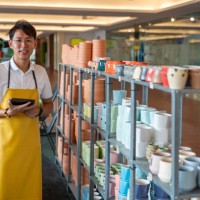 tablet tales: a potter's innovation in blooms - garden decoration stock pictures, royalty-free photos & images