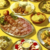 tabletop of platters and bowls of food - food stock illustrations