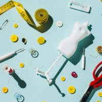 tailoring scissors and sewing supplies and accessories on blue background - fashion stock pictures, royalty-free photos & images