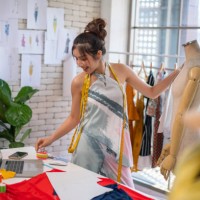 tailors working in studio - fashion stock pictures, royalty-free photos & images