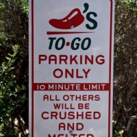 Take-out only parking sign stands at a Brinker International Inc. Chili's Grill & Bar restaurant in San Antonio, Texas, U.S., on Monday, May 7, 2018....
