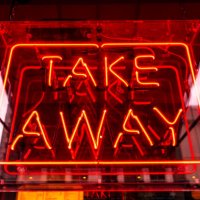 take away illuminated neon sign at the restaurant entrance - junk food stock pictures, royalty-free photos & images