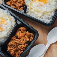 take home box stir-fried chicken basil with rice and fired egg - junk food stock pictures, royalty-free photos & images