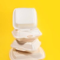 takeaway packaged food. food delivery boxes concept on trendy illuminating yellow background. - junk food stock pictures, royalty-free photos & images