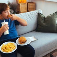 taking a huge bite - junk food stock pictures, royalty-free photos & images
