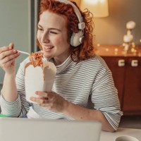 taking a lunch break while working from home - junk food stock pictures, royalty-free photos & images