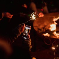 taking a photo of sparklers - garden decoration stock pictures, royalty-free photos & images
