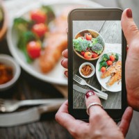 taking photos of grilled salmon steak with vegetables - food stock pictures, royalty-free photos & images