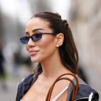 Tamara Kalinic wears black sunglasses, silver earrings, outside Miu Miu, during the Paris Fashion week Women's Fall/Winter 2025-2026 on March 11,...