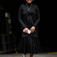 Tamu McPherson is seen wearing a black Sacai ruffled outfit outside the Sacai show during Womenswear Spring/Summer 2025 as part of Paris Fashion Week...