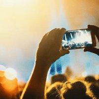taping a concert with smartphone. - concert stock pictures, royalty-free photos & images