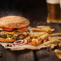tasty hamburger with french fries and beer on wooden table - junk food stock pictures, royalty-free photos & images