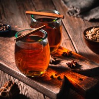 tea or chai tea on wooden board with spices cozy hot drink - home decoration stock pictures, royalty-free photos & images
