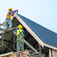 technician working on roof metal cheese in construction site. - home decoration stock pictures, royalty-free photos & images