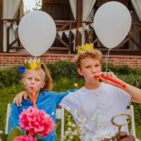 teen kids in crown birthday caps and whistles posing near birthday table - garden decoration stock pictures, royalty-free photos & images