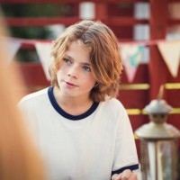 teenage boy looking away in back yard - garden decoration stock pictures, royalty-free photos & images