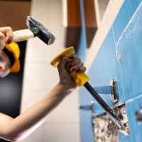 teenage girl doing some home demolition - renovation - home decoration stock pictures, royalty-free photos & images