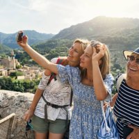 teenage girl, mother and grandmother are sightseeing beautiful town of valldemossa, majorca, spain - travel stock pictures, royalty-free photos & images