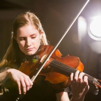 teenage girl playing the violin in concert - concert stock pictures, royalty-free photos & images