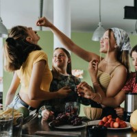teenage girls trying fresh fruit for smoothies - food stock pictures, royalty-free photos & images