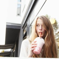 teenager drinking bubble tea - junk food stock pictures, royalty-free photos & images