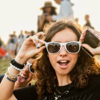 teenagers goofing around at music festival - concert stock pictures, royalty-free photos & images