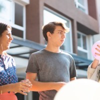 teenagers inflating balloon - garden decoration stock pictures, royalty-free photos & images
