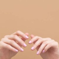 tender hands with perfect blue and pink manicure on trendy pastel pink background. place for text. - nails art stock pictures, royalty-free photos & images