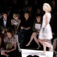 Tennis player Roger Federer, his girlfriend Mirka Vavrinec and editor Anna Wintour sit in the front row at the Oscar de la Renta Spring 2007 fashion...