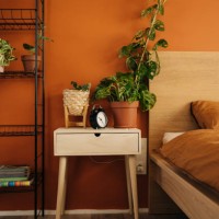 terracotta wall in bedroom with two beds - fashion stock pictures, royalty-free photos & images
