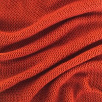 texture of knitted red sweater folded in a swirling pattern. flat lay style, close-up. - fashion stock pictures, royalty-free photos & images