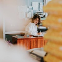 thai wholesale owner writing to bill for customer before sending rice - food stock pictures, royalty-free photos & images