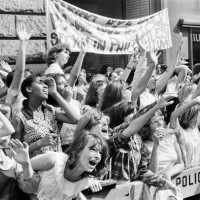 The Beatles in New York City, on their North American Tour ahead of their concert to be held at Forest Hills. Cheering fans gathered outside the...