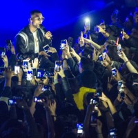 The crowd take photographs with camera phones as Daniel Daley of DVSN performs along the front row at The O2 Kentish Town Forum on March 17, 2018 in...