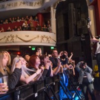 The crowd watch on as Joel Peat of Lawson performs solo at O2 Shepherd's Bush Empire on October 23, 2018 in London, England.