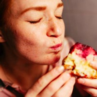 the female cake eater. - food stock pictures, royalty-free photos & images
