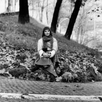 The Italian film, theatre and television actress Paola Pitagora is seated with crossed legs on a garden covered with fallen leaves; the actress, who...