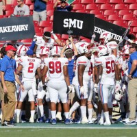 The SMU Mustangs defense celebrates a takeaway during the College Football game between the SMU Mustangs and the South Florida Bulls on September 28,...