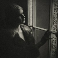 the woman at the window at night. - fashion stock pictures, royalty-free photos & images