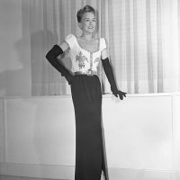 This dinner gown, created by Jo Copeland for Pattullo Modes, is one of the models that has drawn the attention of fashion experts, in New York City...